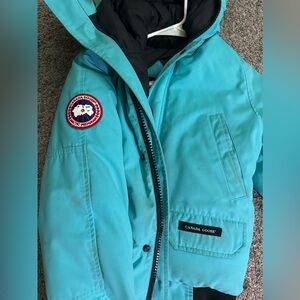 Turquoise Canada Goose Bomber Coat
Girls L/ Woman’s Small/XS
l